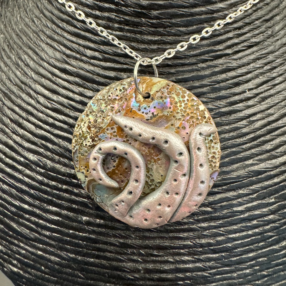 Artistic Silver and Gold Pendant Necklace